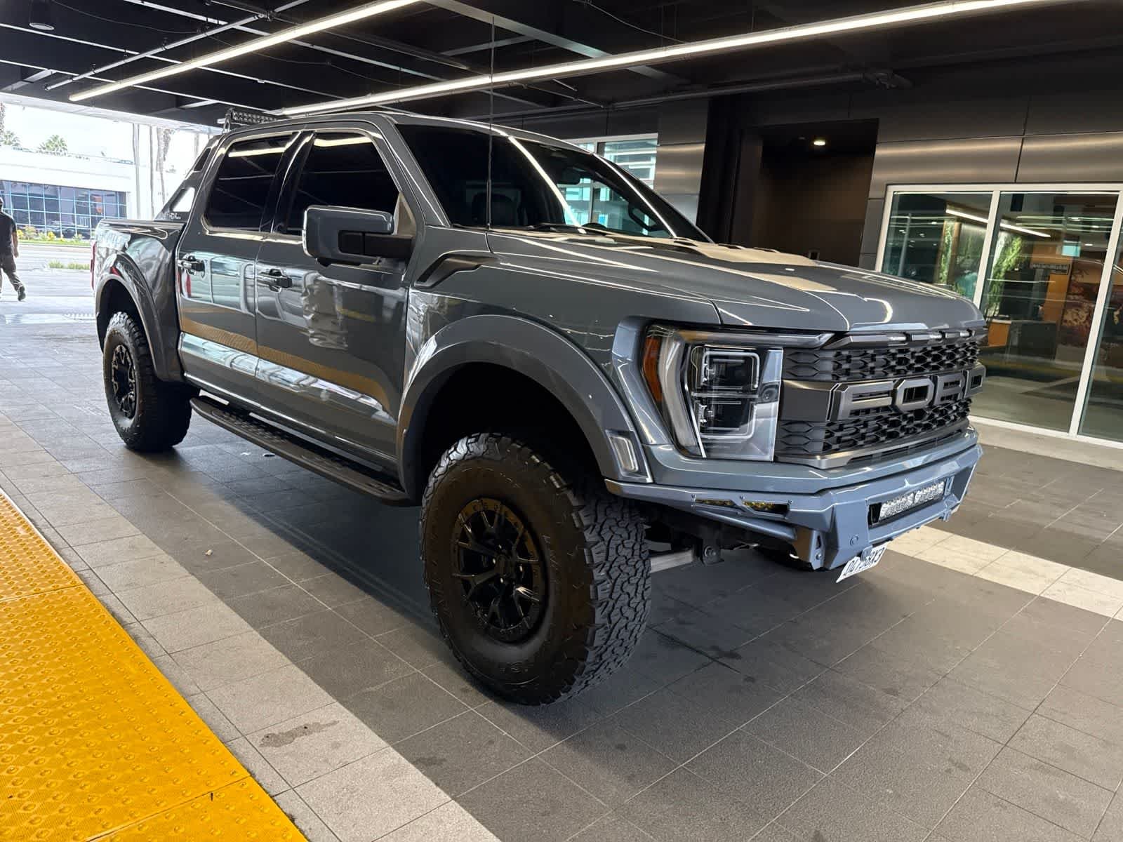 Used 2023 Azure Gray Metallic Tri-Coat Ford Raptor image 9