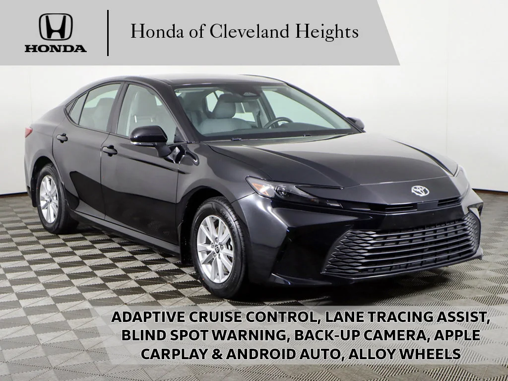 Used 2025 Midnight Black Metallic Toyota LE image 1