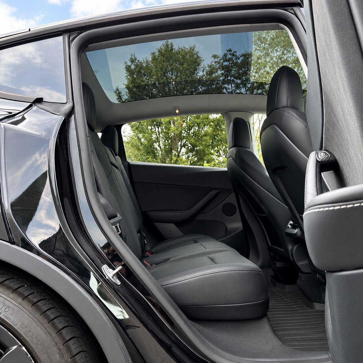 Used 2022 Solid Black Tesla Performance image 13