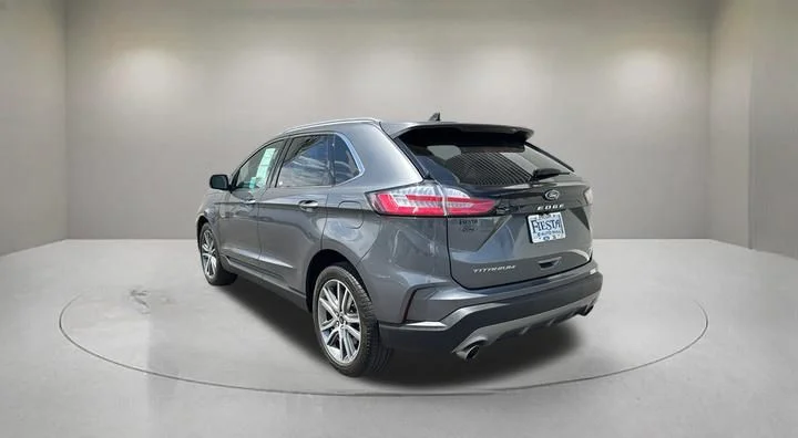 Certified Used 2024 Light Blue Clearcoat Metallic Ford Titanium image 4