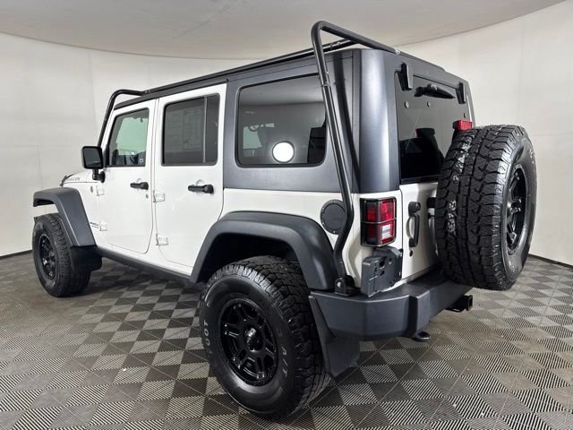 Used 2010 White Jeep Unlimited Rubicon image 6