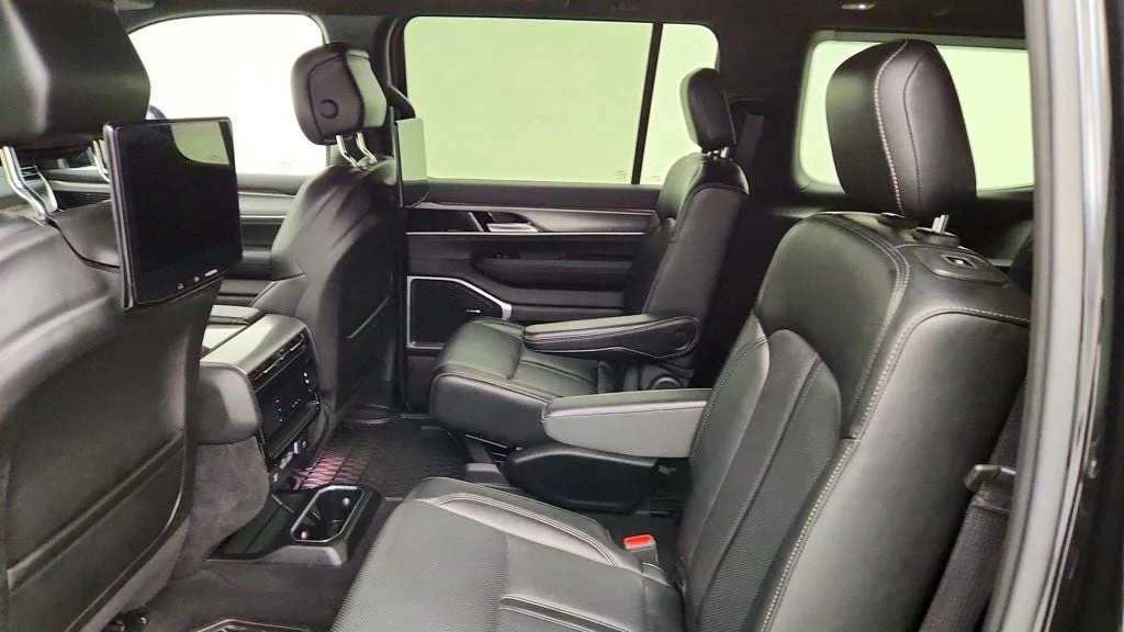 Used 2025 Diamond Black Crystal Pearlcoat Jeep Series II Carbide 4x4 w/ Rear Entertainment & 20
