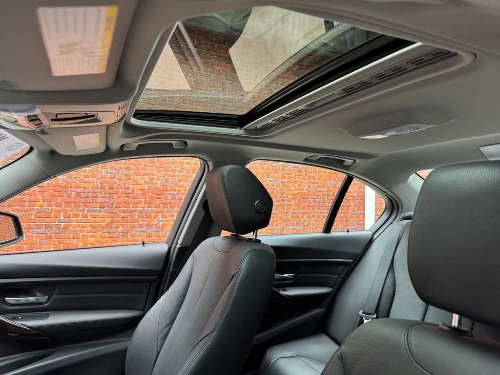 Used 2015 Black BMW 320i xDrive image 3