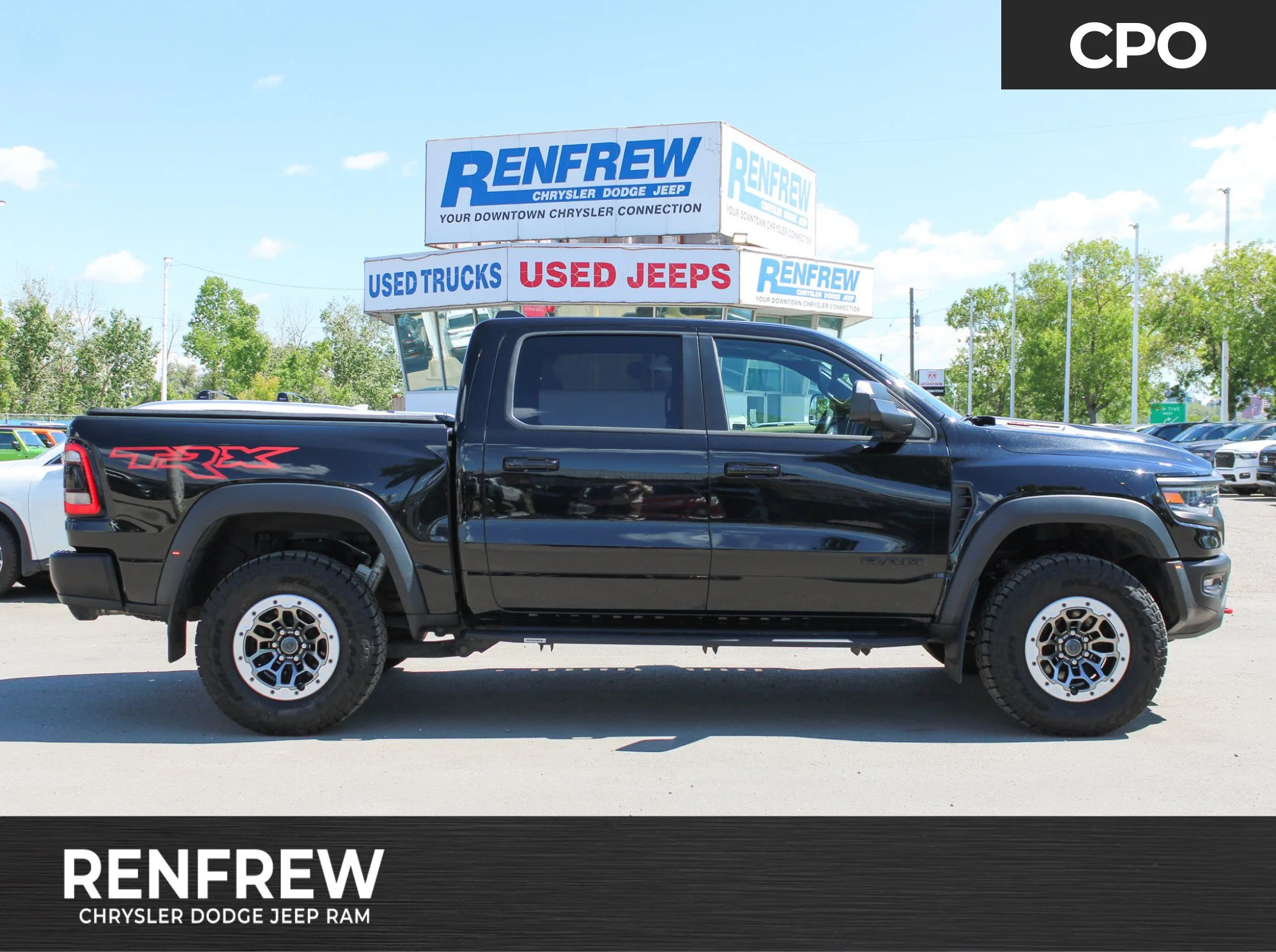 Certified Used 2023 Black RAM TRX * | 702 HP | Supercharged V8 | Tonneau Cover | Apple CarPlay | Heated/Vented Seats image 1
