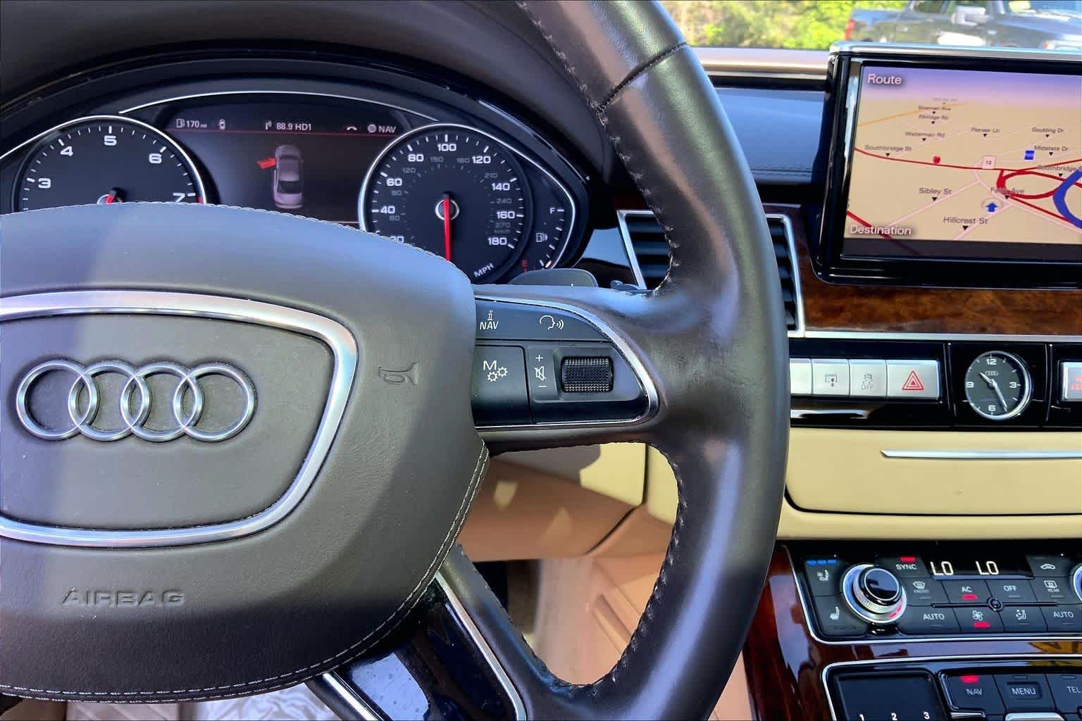 Used 2012 Emerald Black Metallic Audi  image 25