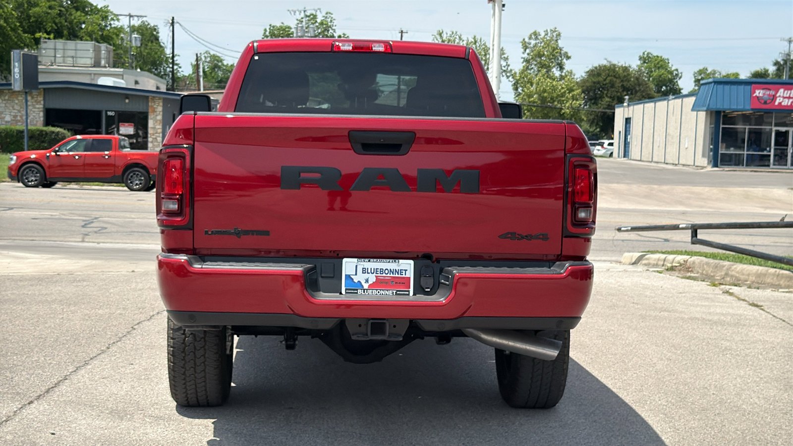 New 2026 Molten Red Pearl-Coat Exterior Paint RAM Lone Star image 6