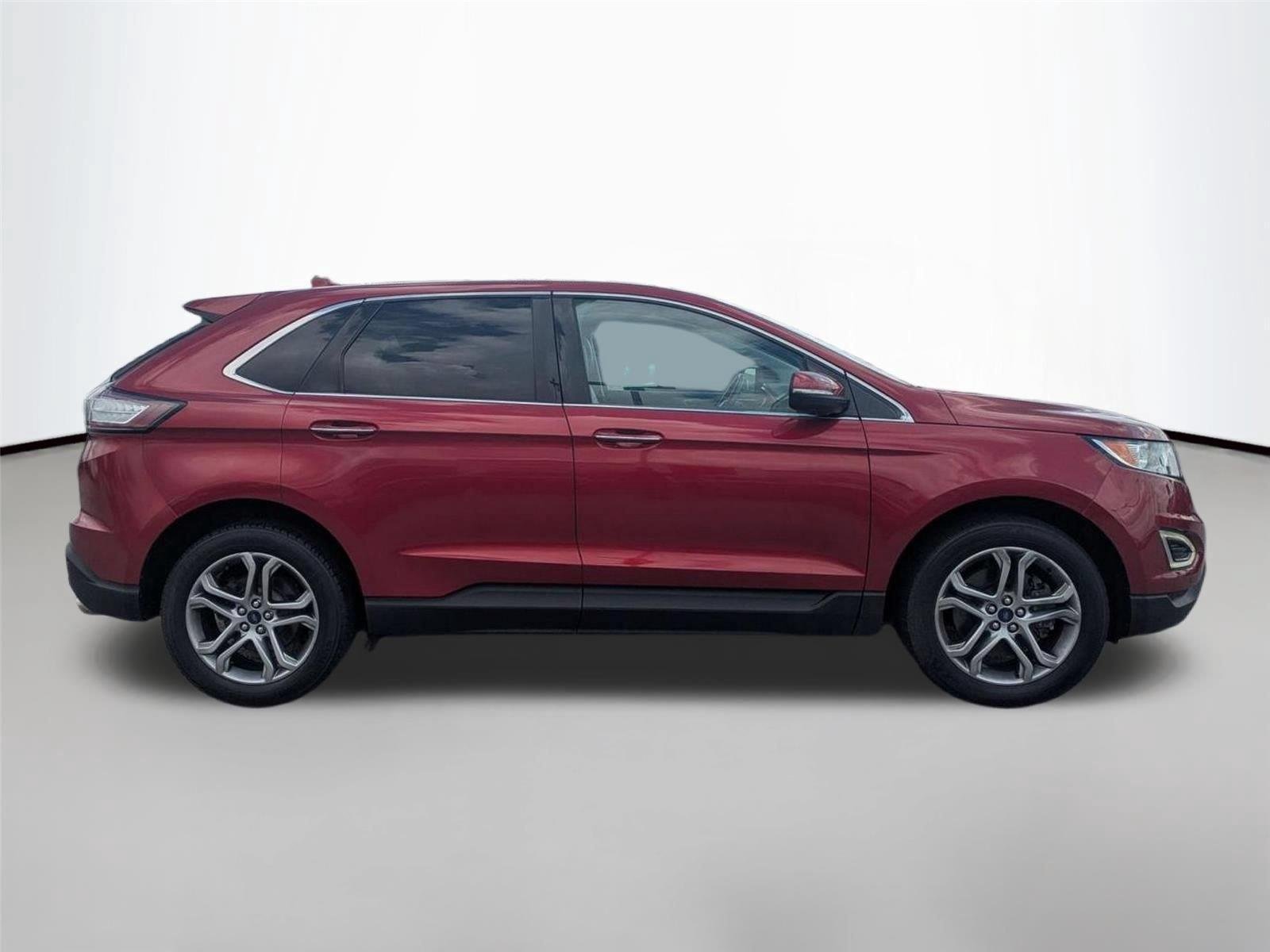 Used 2016 Ruby Red Metallic Tinted Clearcoat Ford Titanium image 4