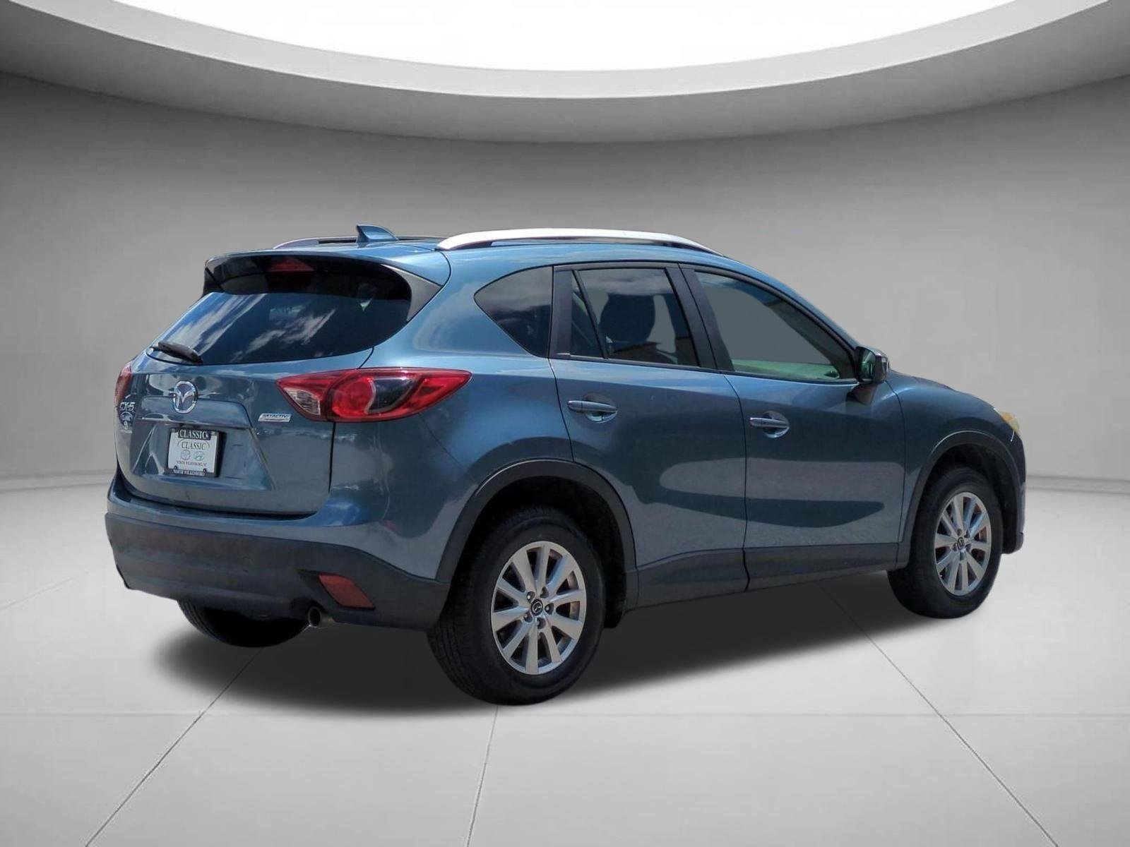 Used 2015 Blue Reflex Mica Mazda Touring image 5