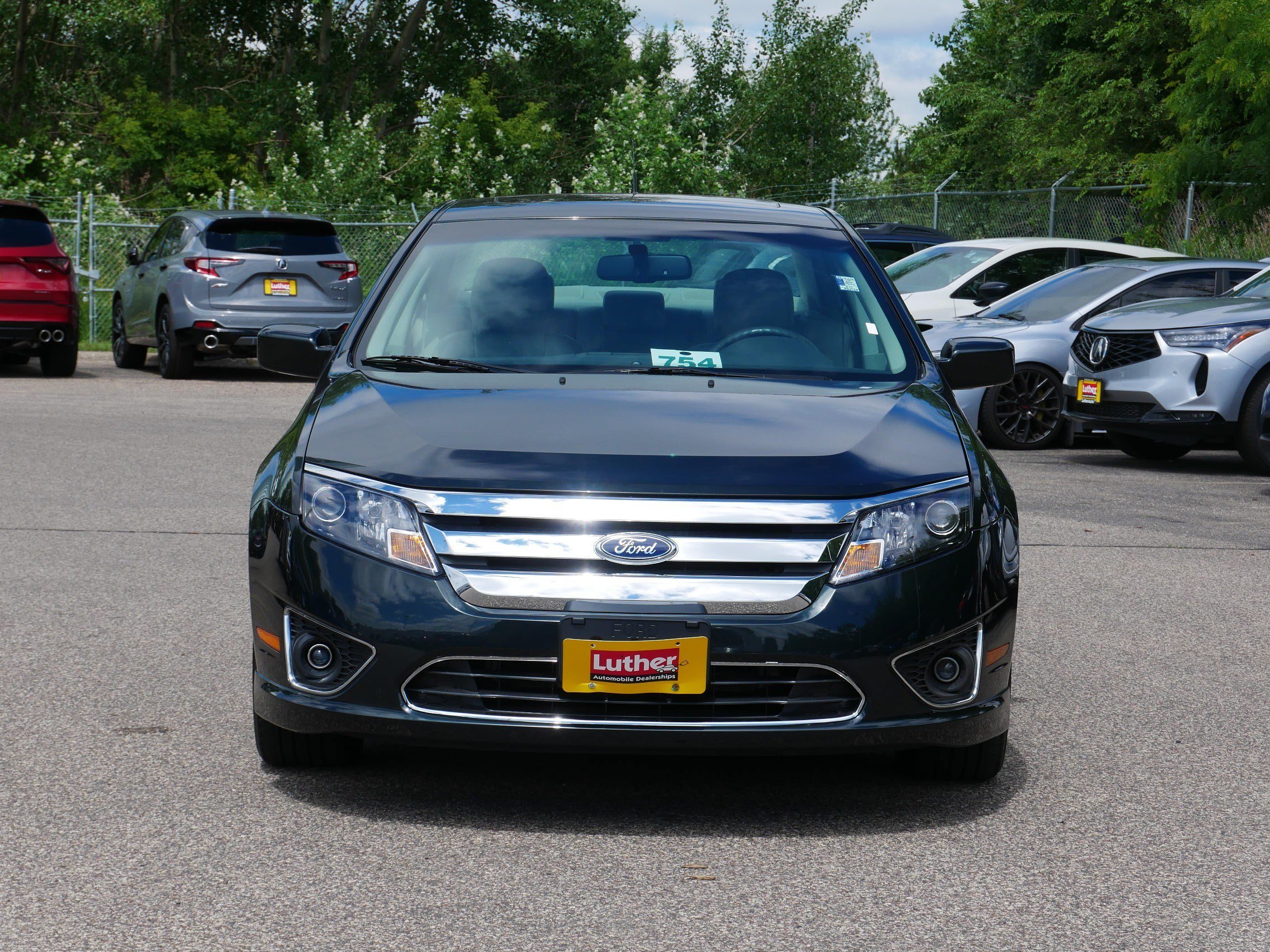 Used 2010 Ford Fusion Hybrid with VIN 3FADP0L34AR132947 for sale in Vadnais Heights, Minnesota