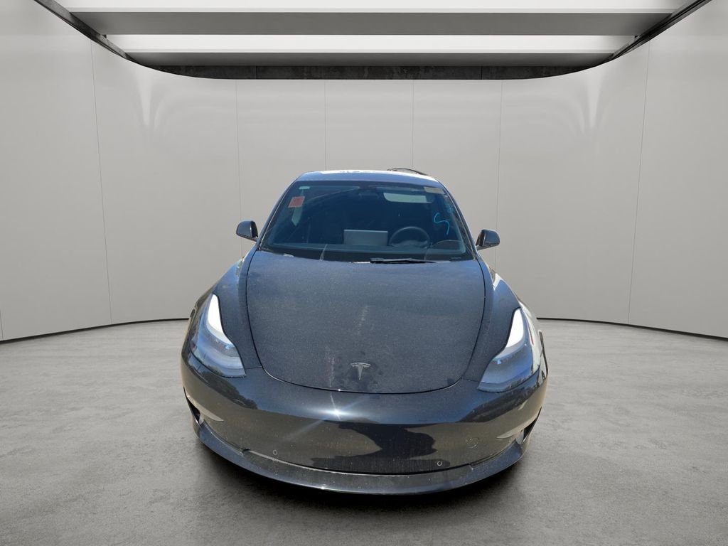 Used 2022 Solid Black Tesla Performance image 15