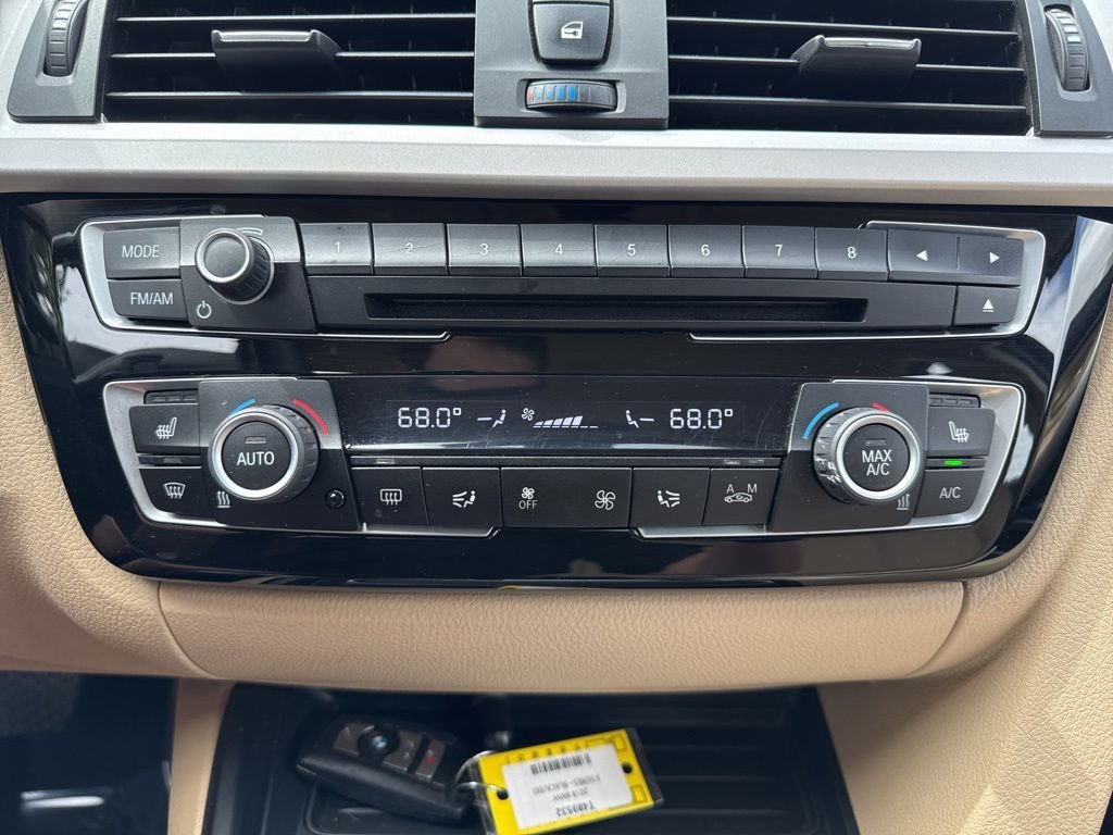 Used 2018 Black Sapphire Metallic BMW 320i xDrive image 18