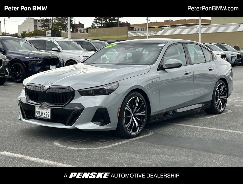 Used 2026 Brooklyn Grey Metallic BMW 550e xDrive image 1