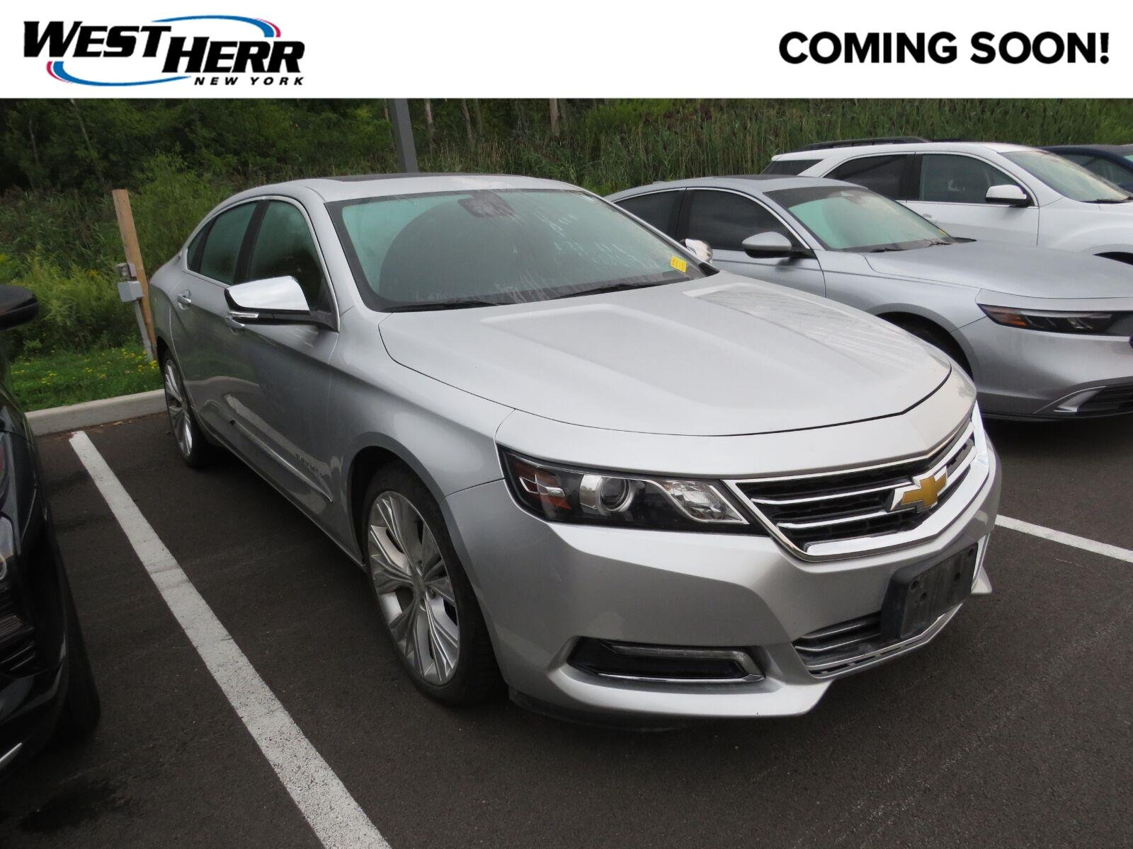 Used 2014 Silver Ice Metallic Chevrolet LTZ image 1