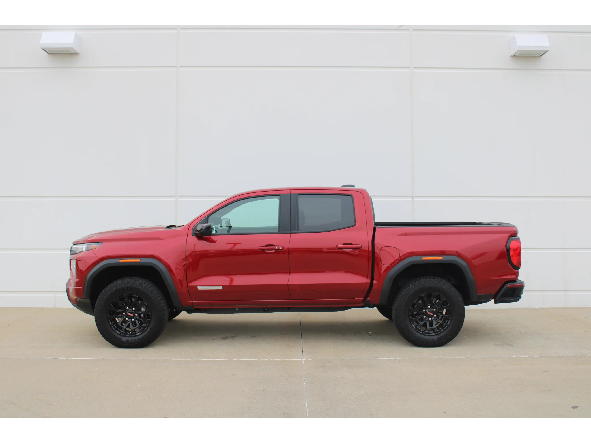 New 2026 VOLCANIC RED TINTCOAT GMC 2WD Elevation image 3