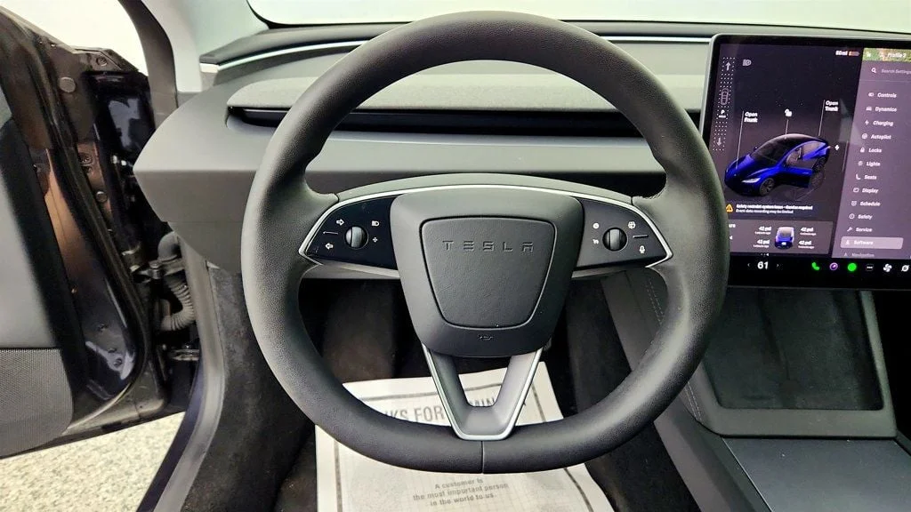 Used 2025 Stealth Grey Tesla Long Range RWD w/ Traffic Aware Cruise Control image 13