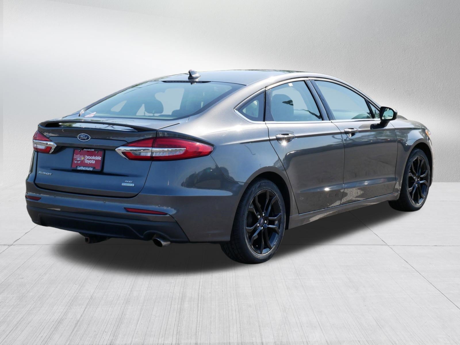 Used 2020 Magnetic Metallic Ford SE image 7