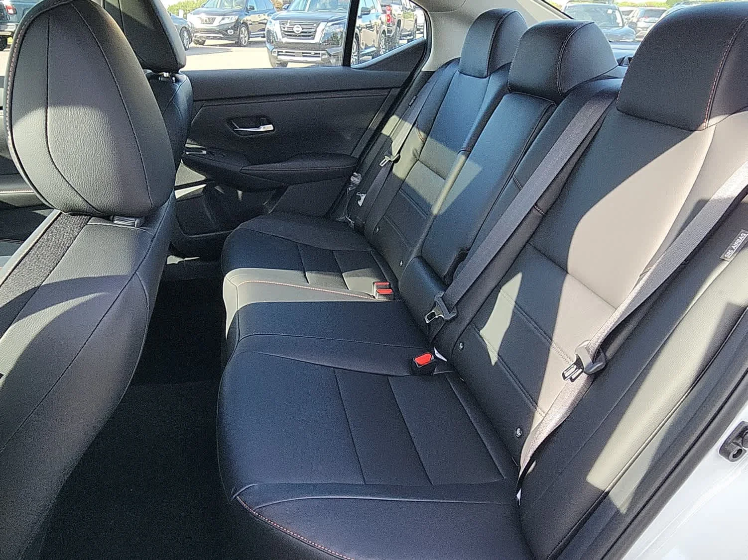 Used 2025 Aspen White Tricoat/Super Black Nissan SR image 7