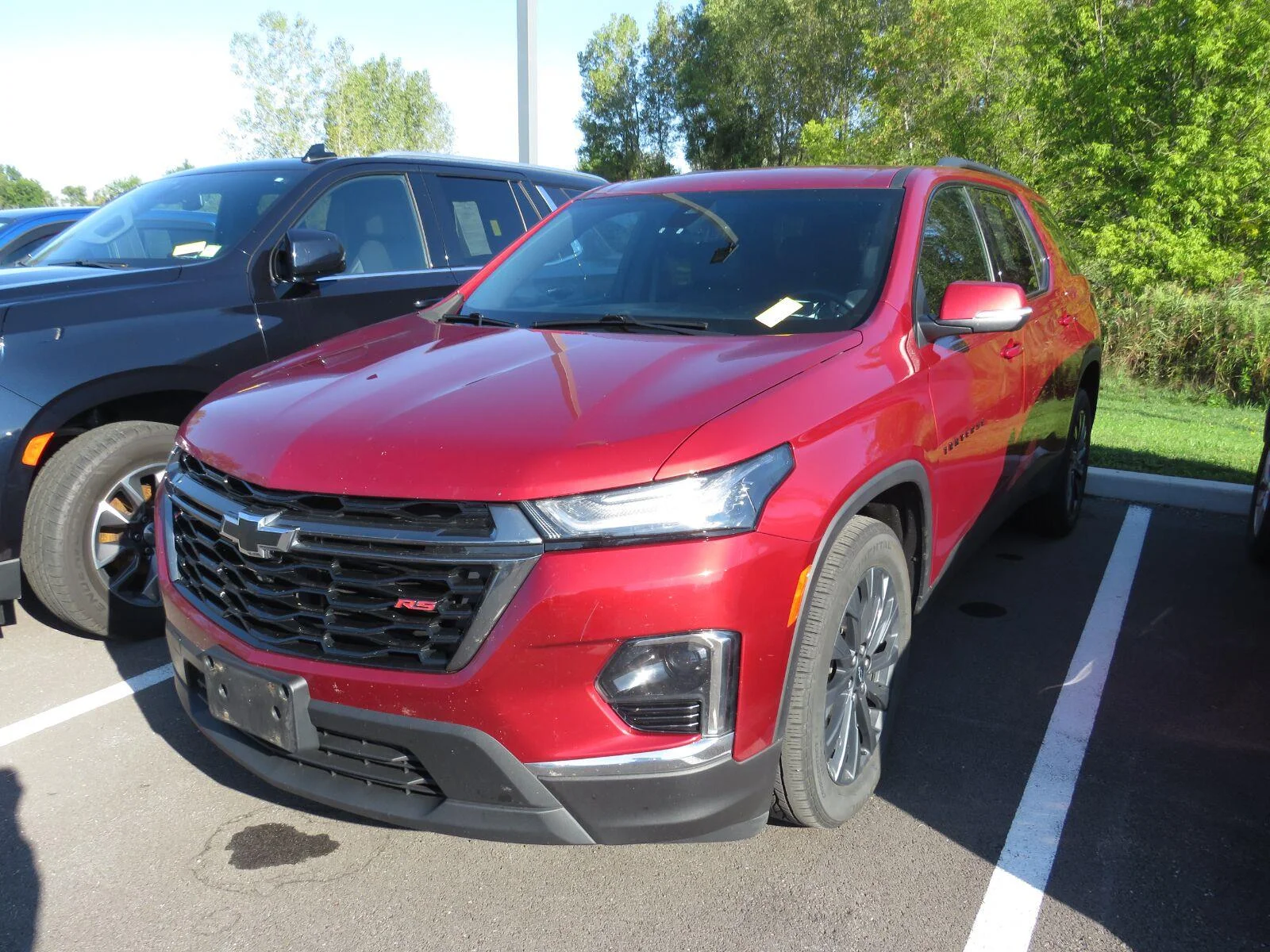 Used 2023 RADIANT RED TINTCOAT Chevrolet RS image 4
