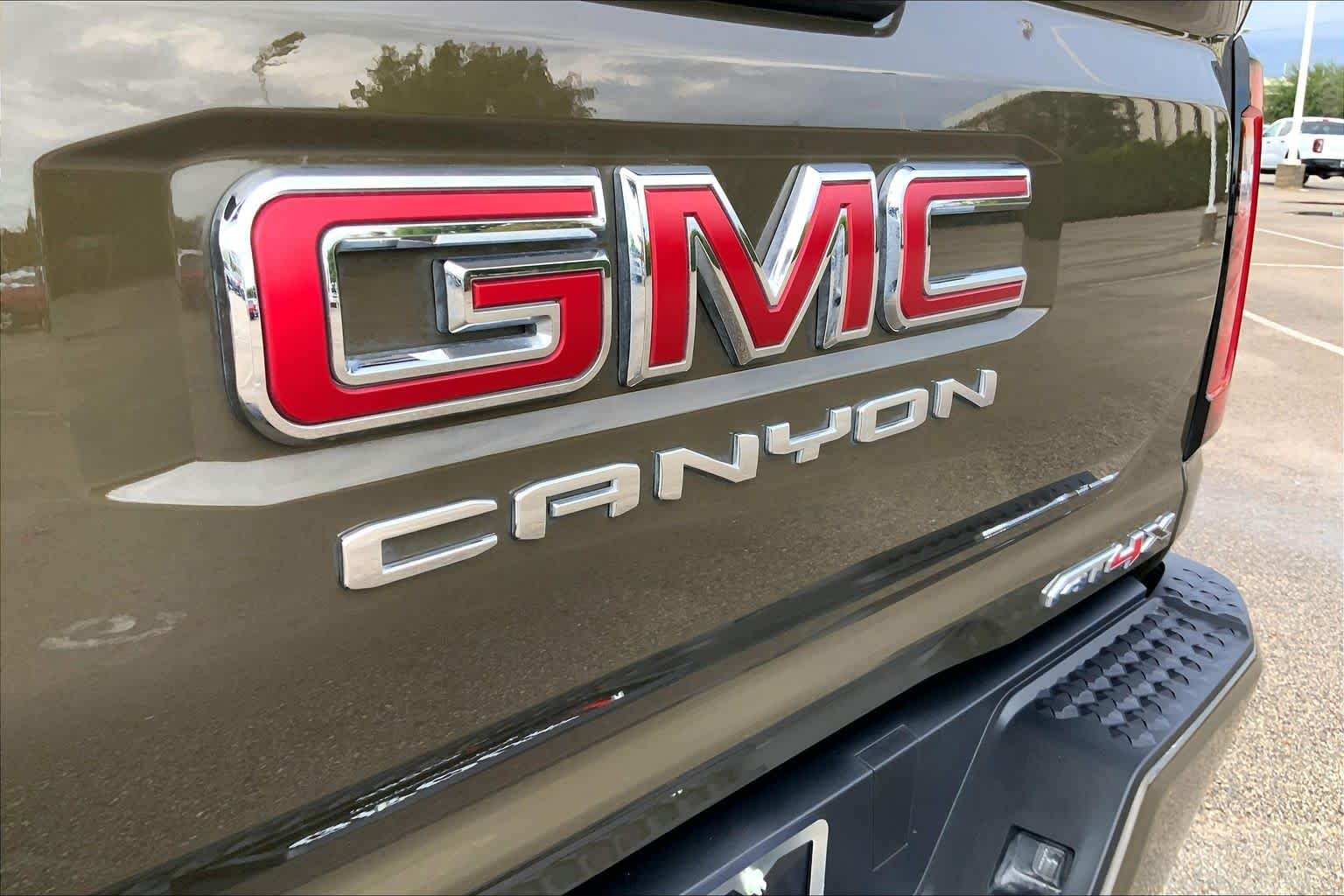 Used 2024 Deep Bronze Metallic GMC 4WD AT4X image 31