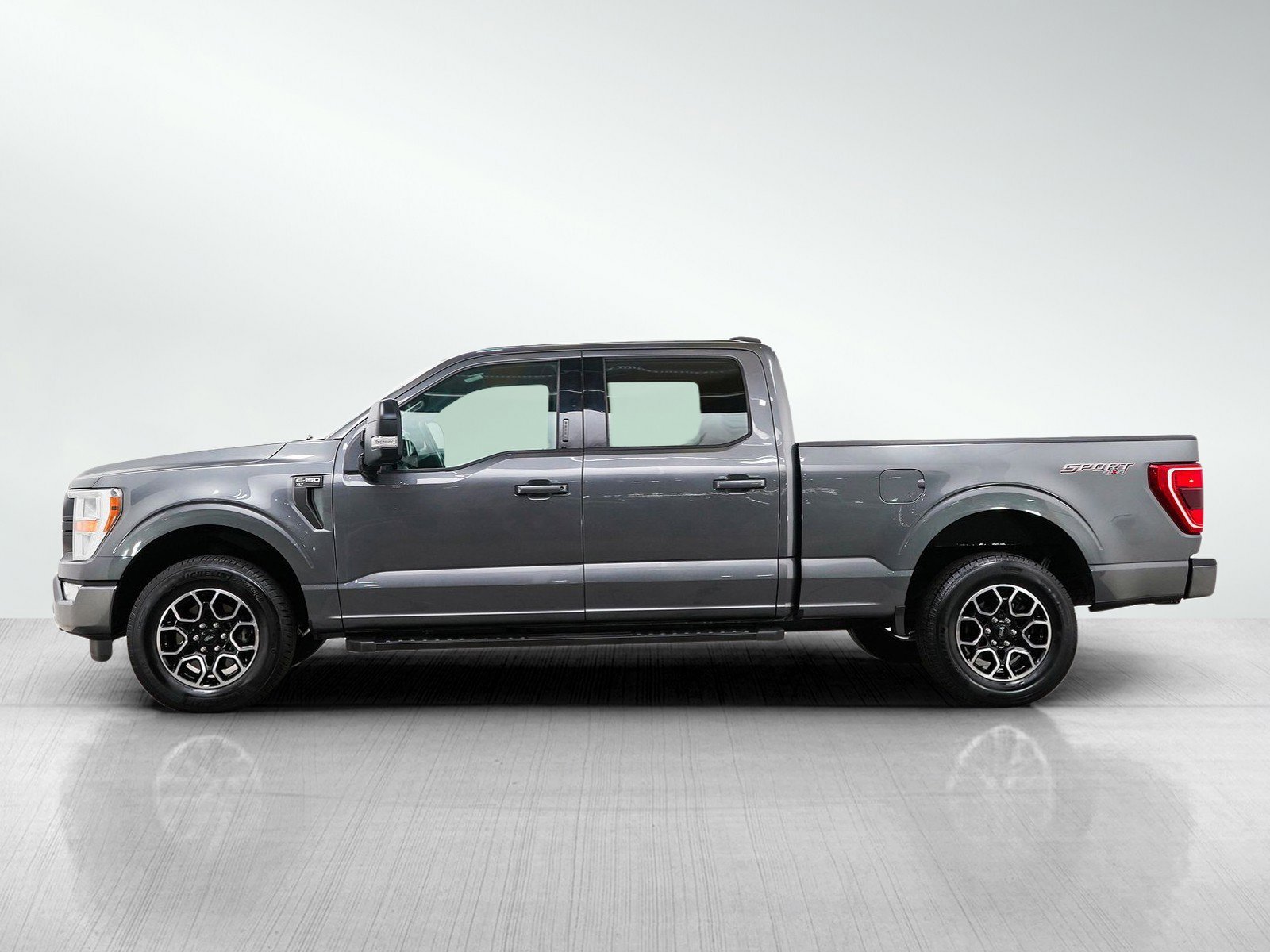 Used 2021 Ford F-150 XLT with VIN 1FTFW1E59MFA00651 for sale in Burnsville, Minnesota