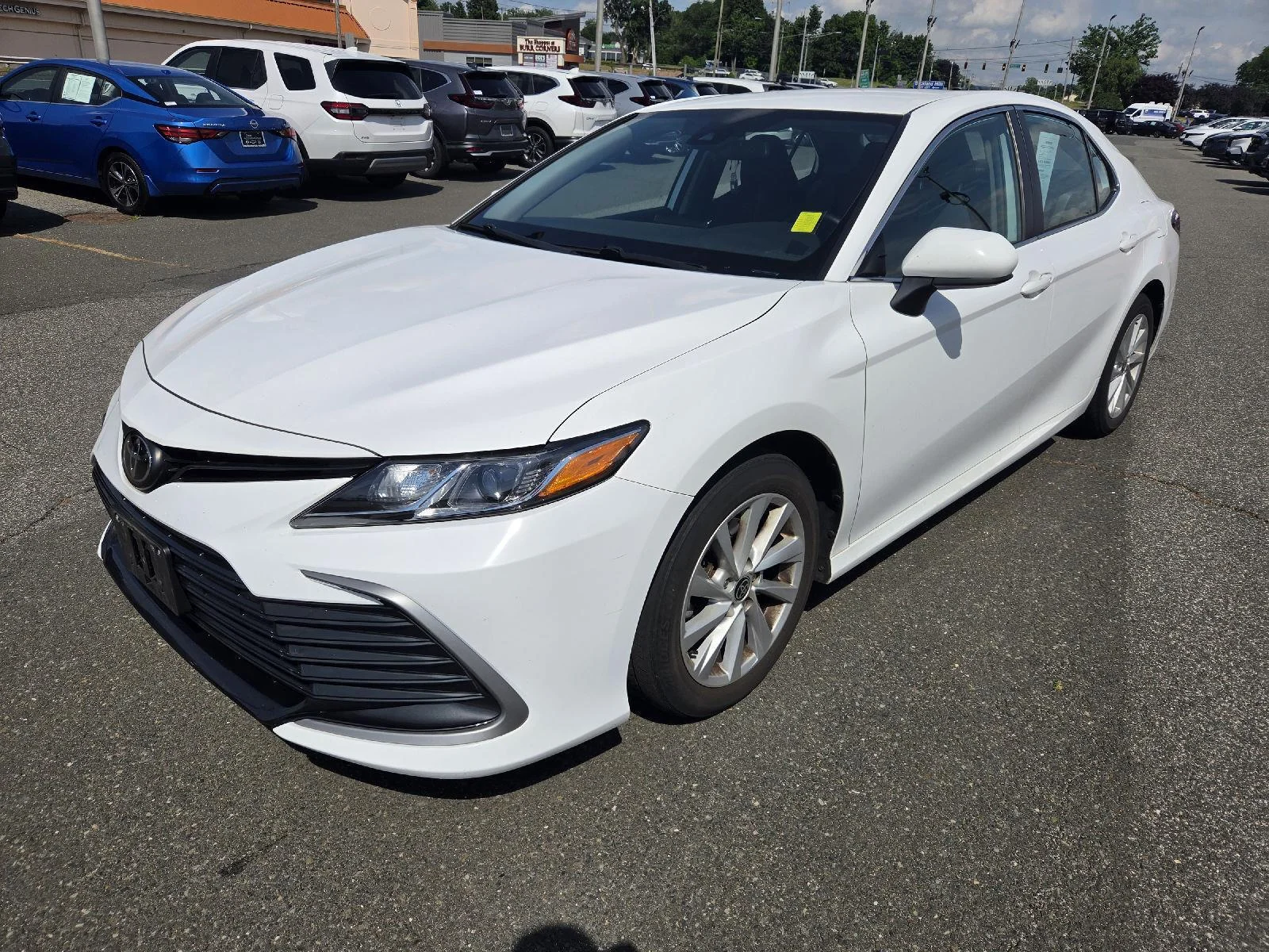 Used 2022 Super White Toyota LE image 3