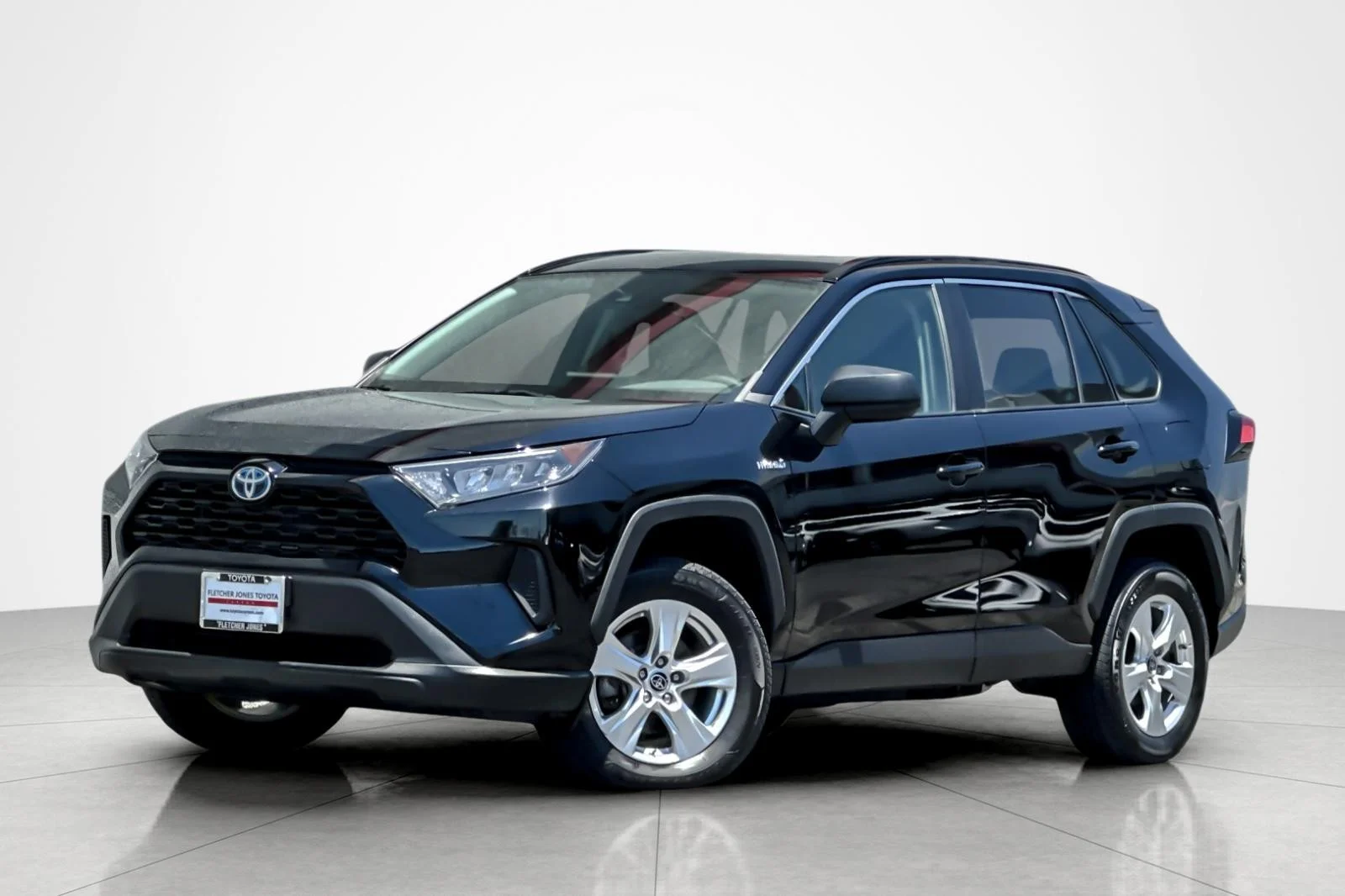 Used 2021 MIDNIGHT BLACK Toyota Hybrid LE image 1