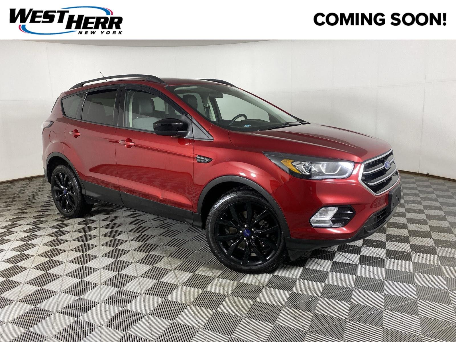 Used 2017 Ruby Red Metallic Tinted Clearcoat Ford SE image 1