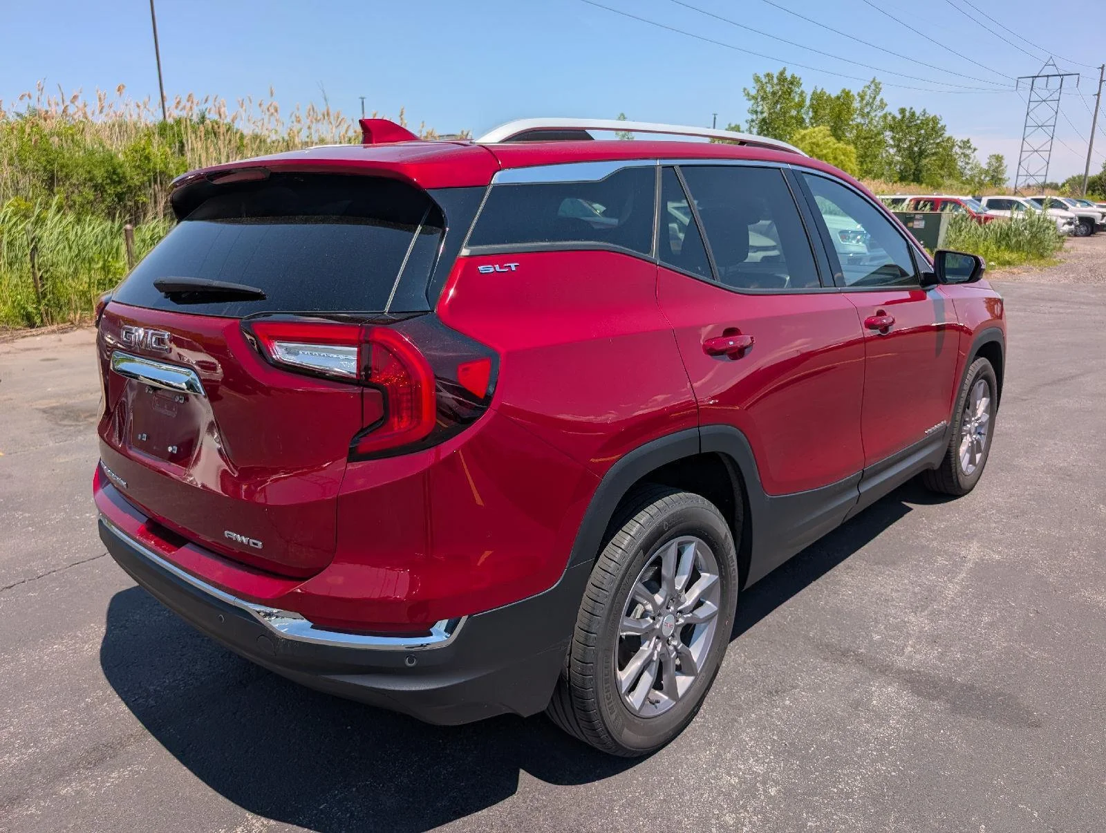 Used 2024 Volcanic Red Tintcoat GMC SLT image 7