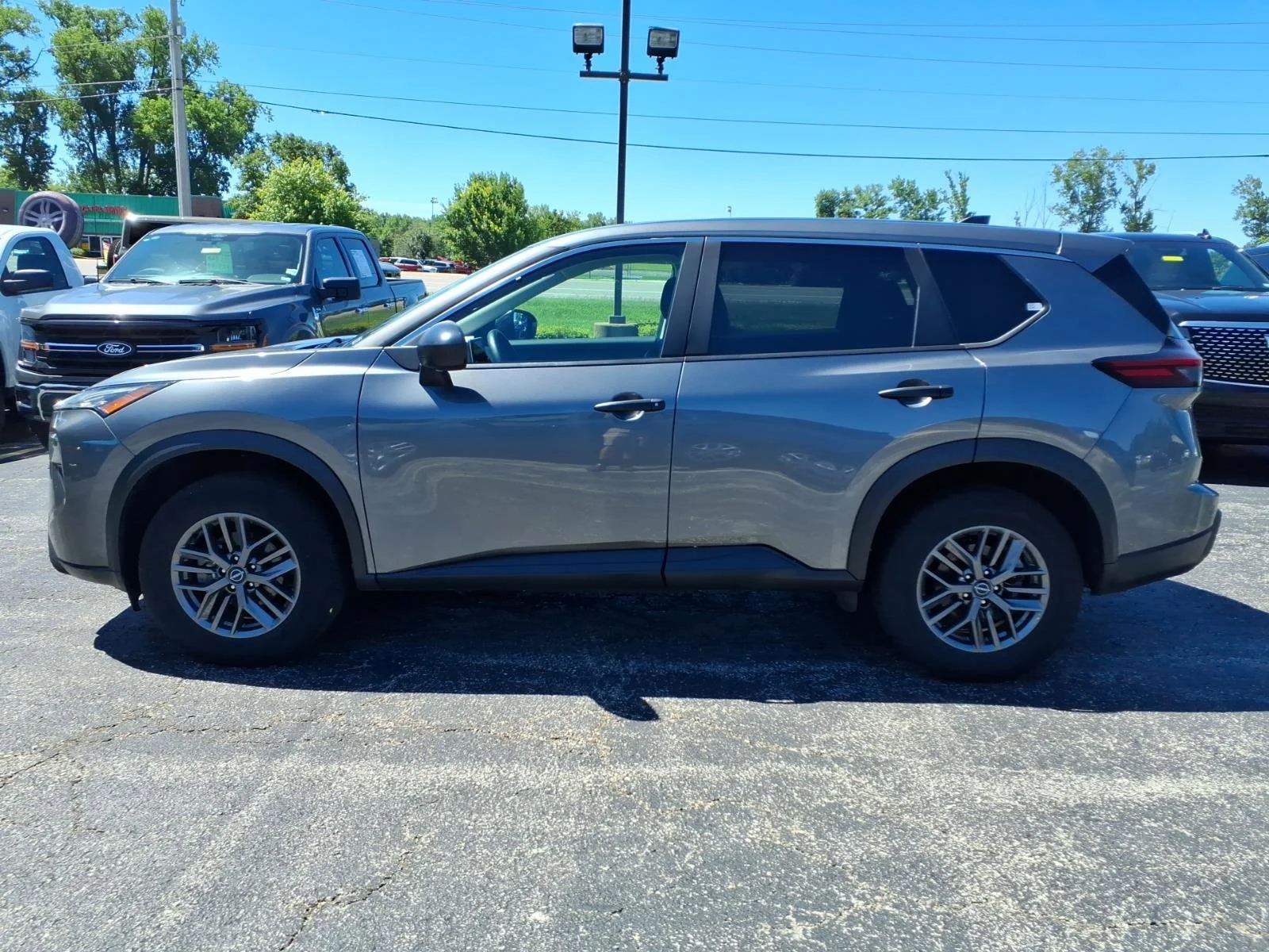 Used 2024 Gun Metallic Nissan S image 5