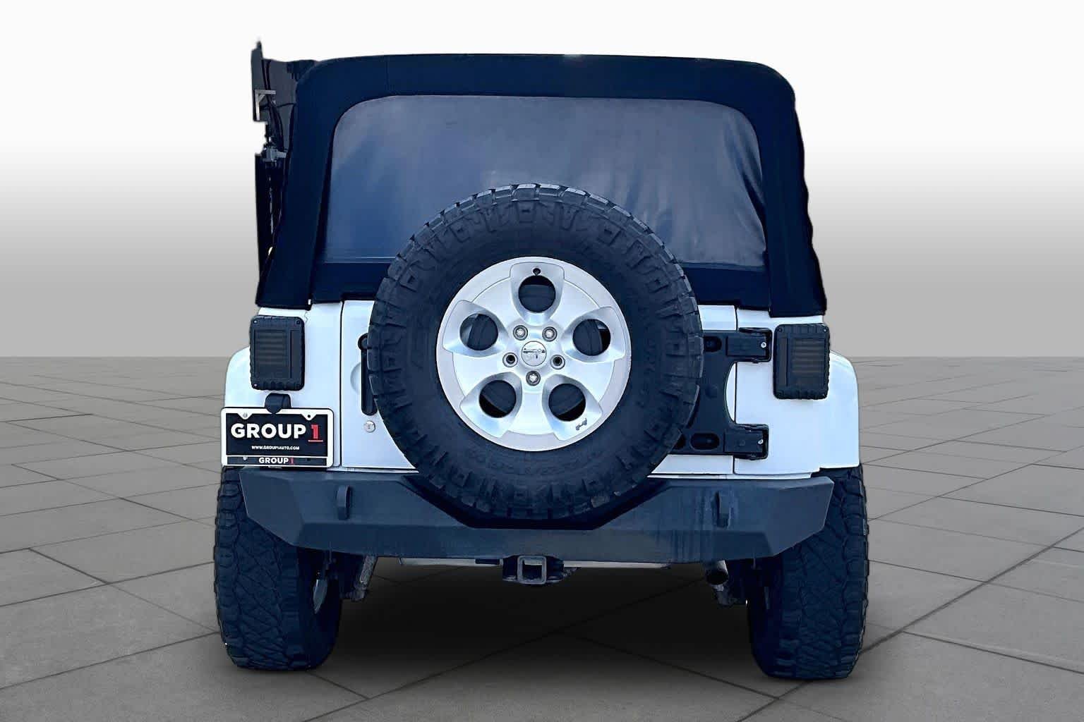 Used 2014 Bright White Clearcoat Jeep Sahara image 4