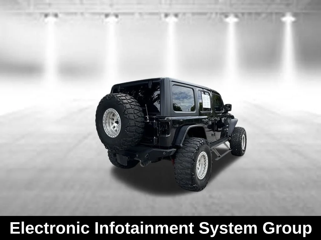 Used 2018 Black Jeep Unlimited Sahara image 6