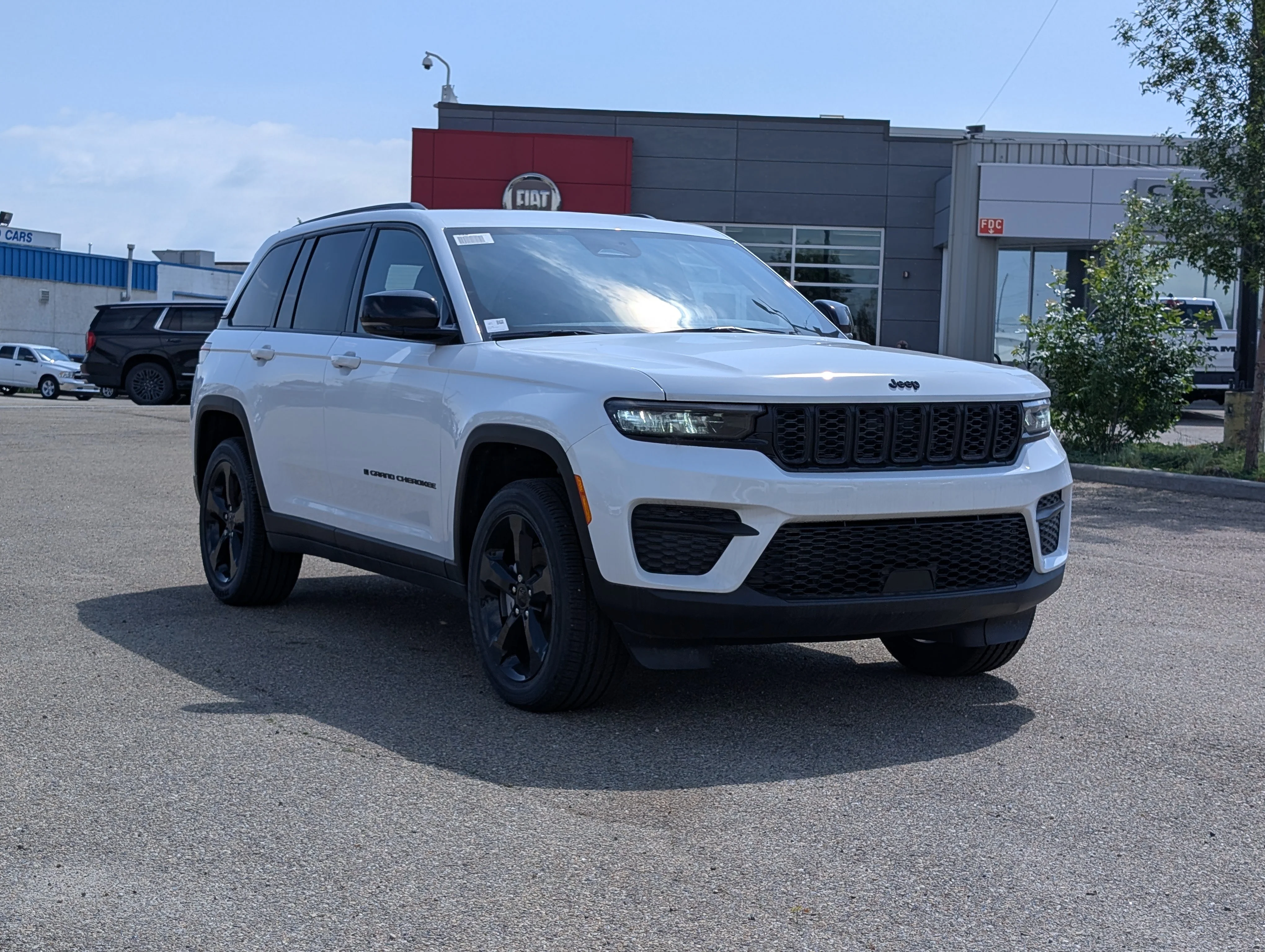 New 2025 Bright White Jeep Altitude image 9