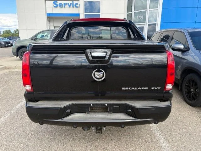 Used 2007 Black Raven Cadillac Base image 4