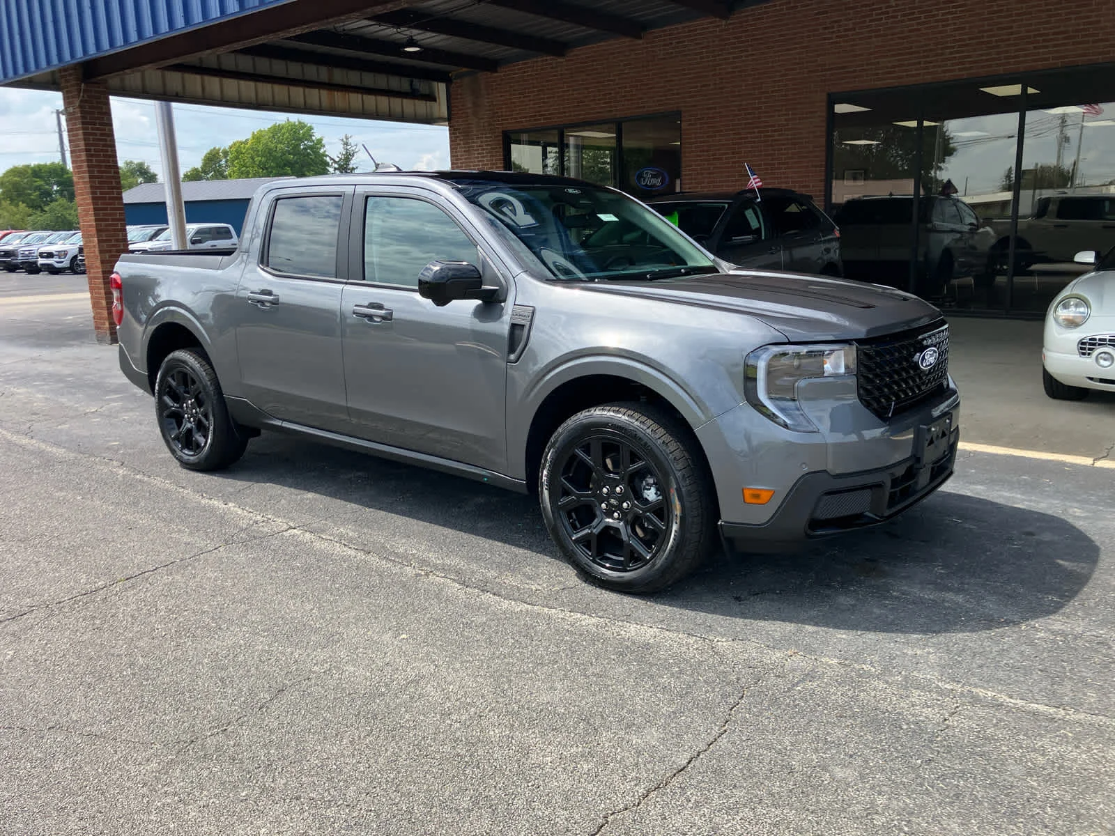 New 2026 Carbonized Gray Metallic Ford LARIAT image 2