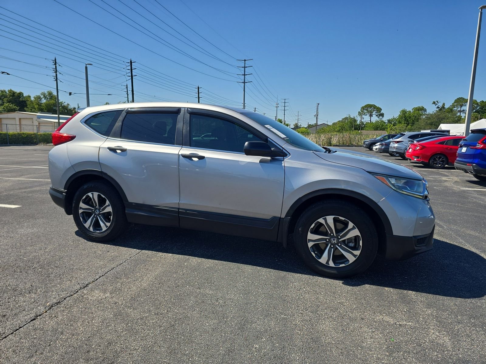 Used 2017 Honda CR-V LX with VIN 7FARW5H39HE015163 for sale in Port Richey, FL