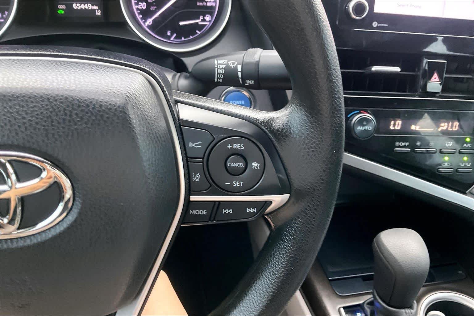 Used 2022 Midnight Black Metallic Toyota Hybrid LE image 23