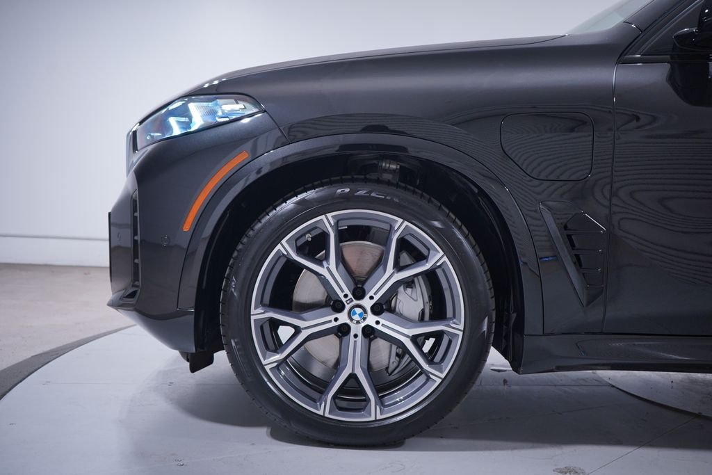 Used 2026 Black Sapphire Metallic BMW xDrive50e image 2