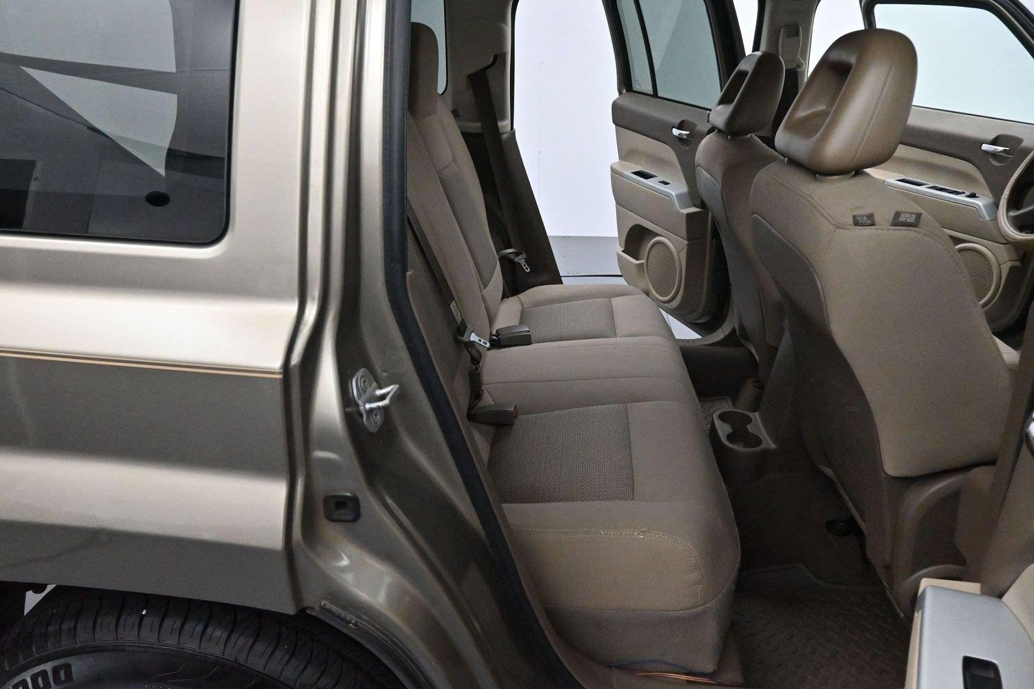 Used 2008 Light Khaki Metallic Jeep Sport image 24