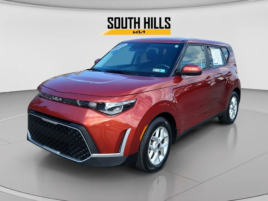 Used 2024 Orange Kia LX image 1