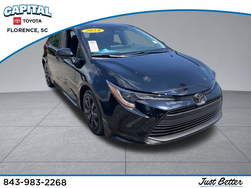 Used 2024 Black Toyota LE image 1