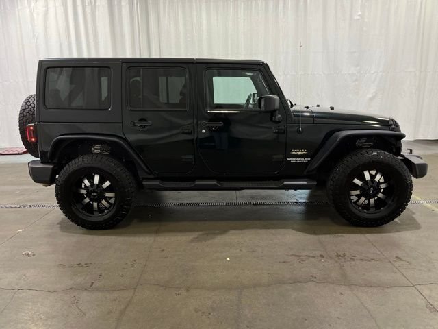Used 2012 Jeep Wrangler Unlimited Sahara with VIN 1C4BJWEG7CL235139 for sale in Grants Pass, OR