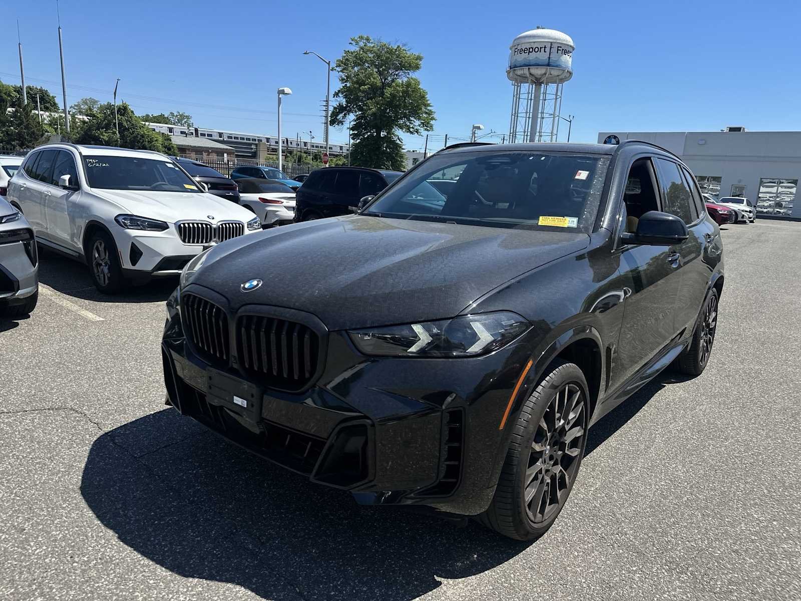 Certified Used 2024 Black Sapphire Metallic BMW xDrive40i image 2