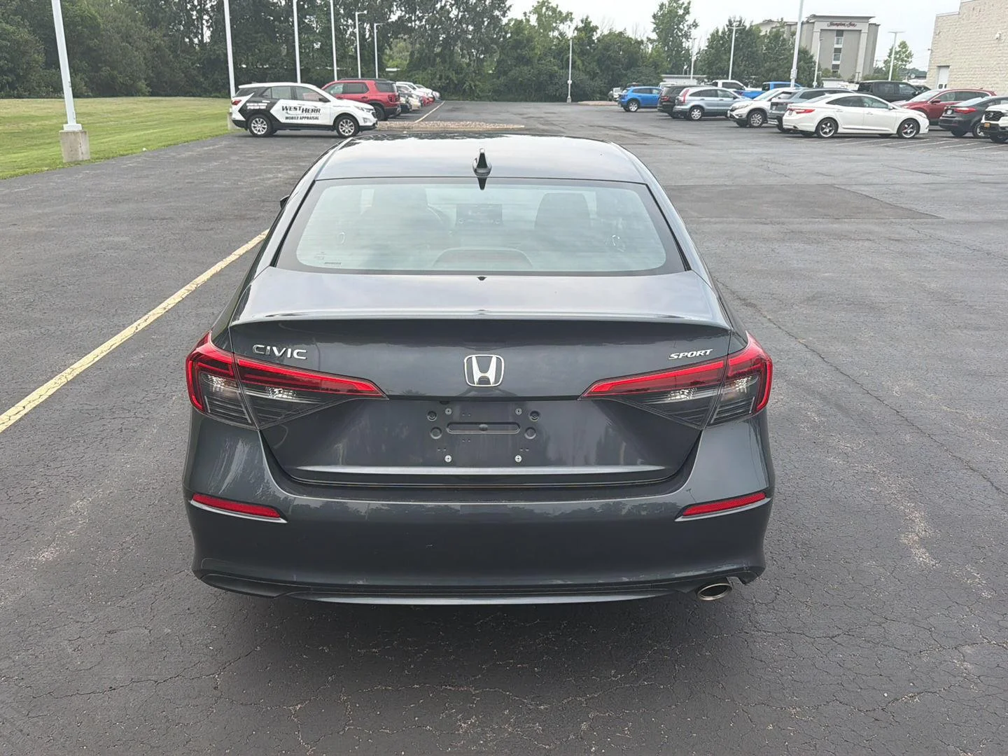 Used 2023 Meteorite Gray Metallic Honda Sport image 6