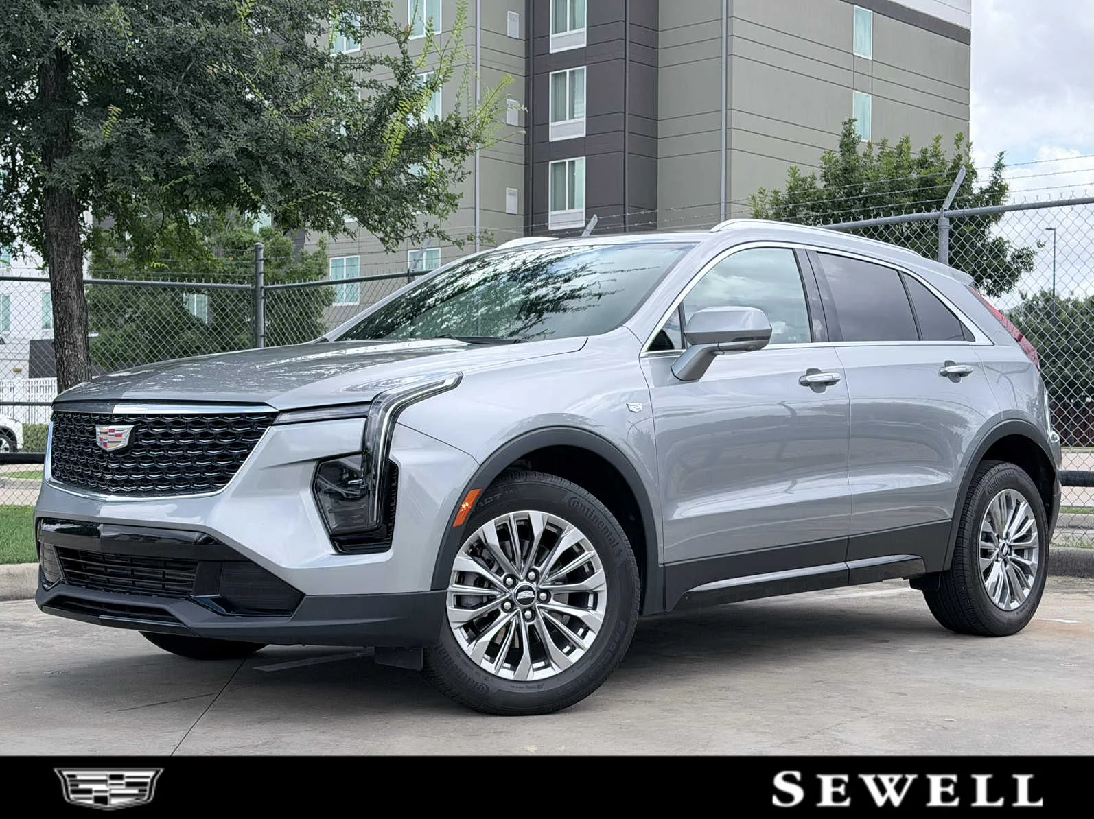 Used 2024 Argent Silver Metallic Cadillac Premium Luxury image 1