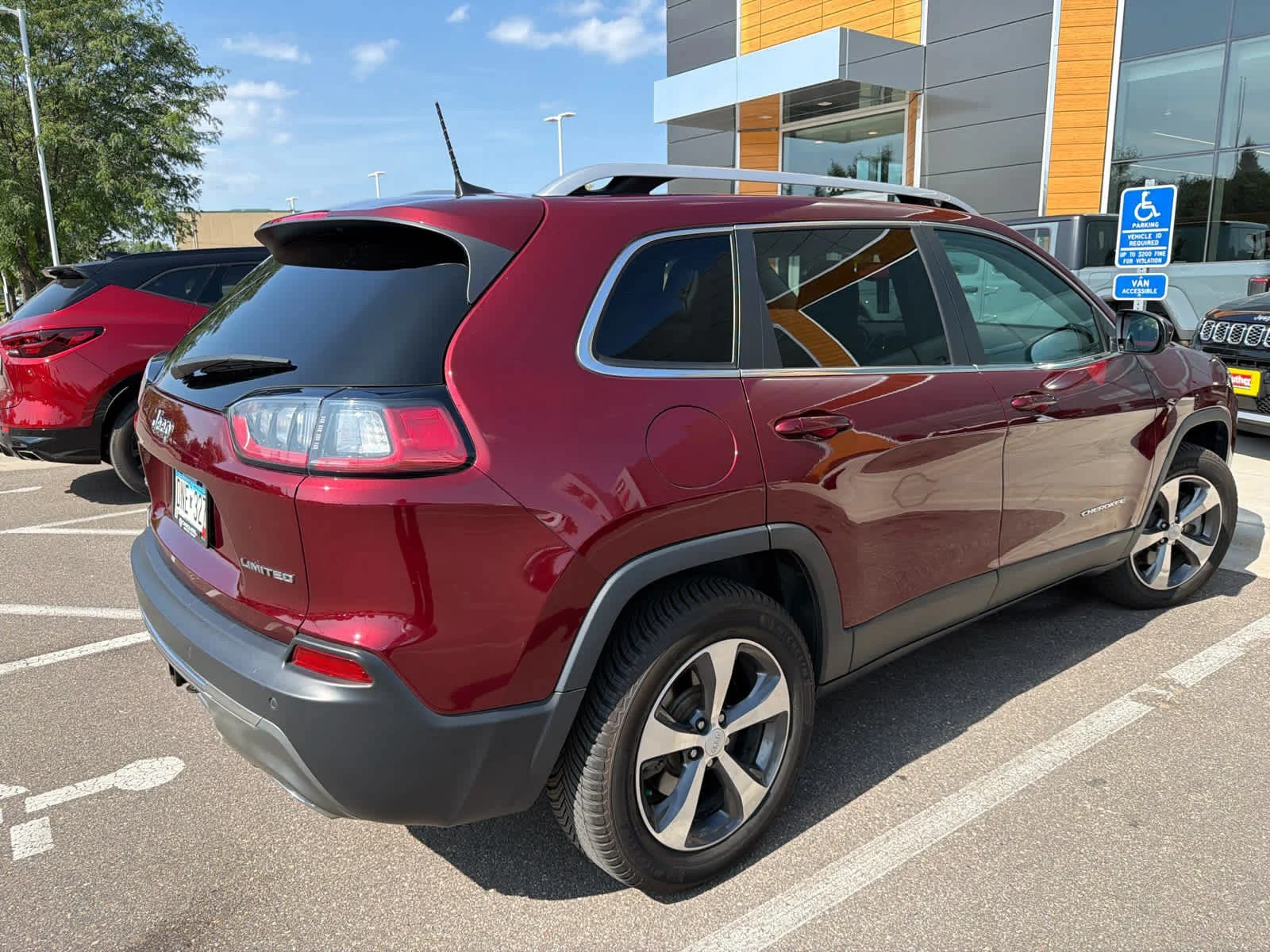Used 2019 Velvet Red Pearlcoat Jeep Limited image 3