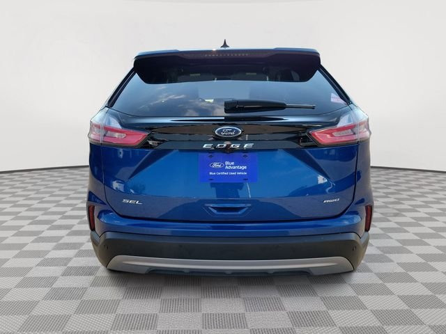 Certified Used 2024 Blue Metallic Ford SEL image 4