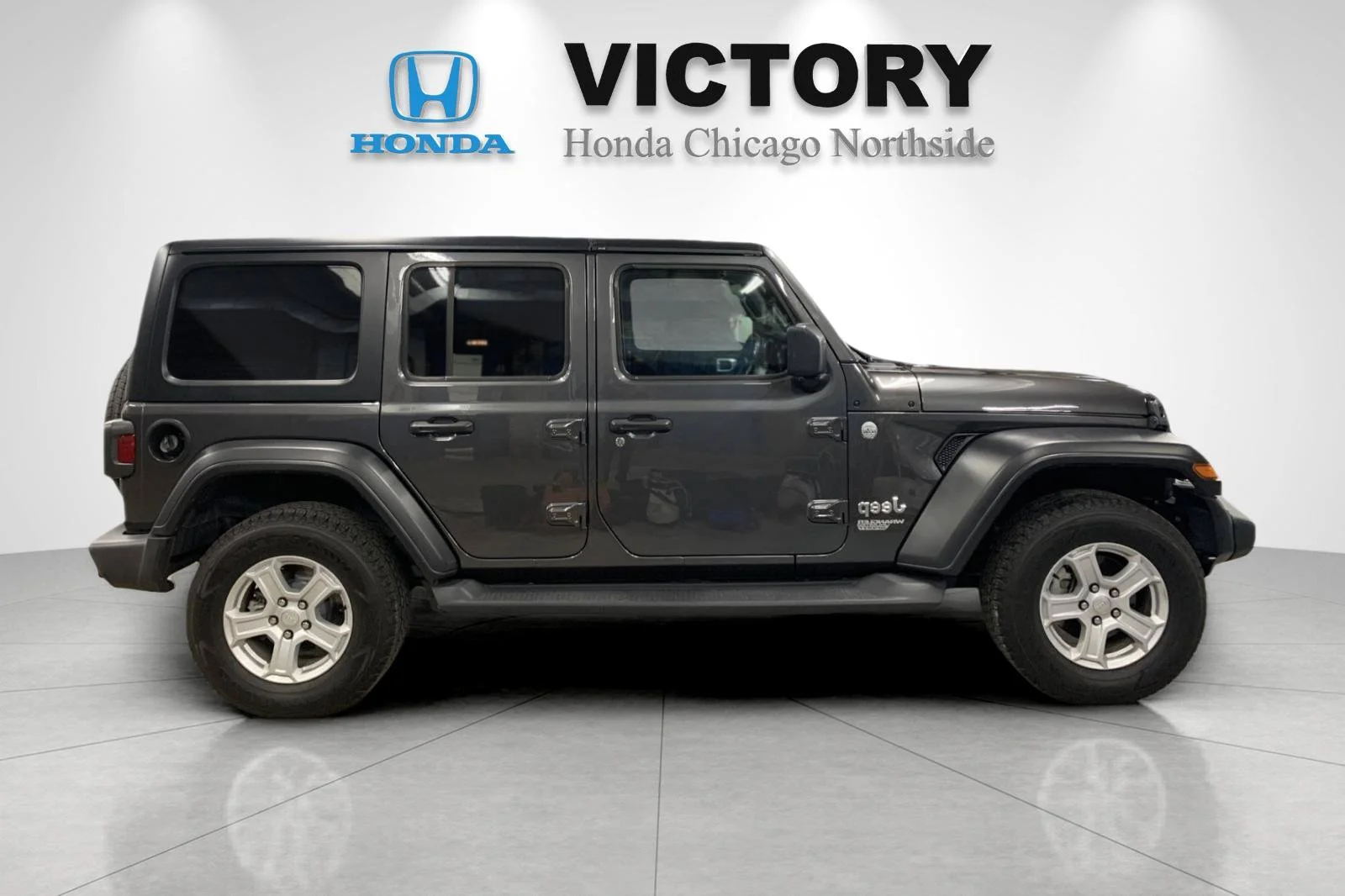 Used 2021 Crystal Metallic Jeep Unlimited Sport S image 2