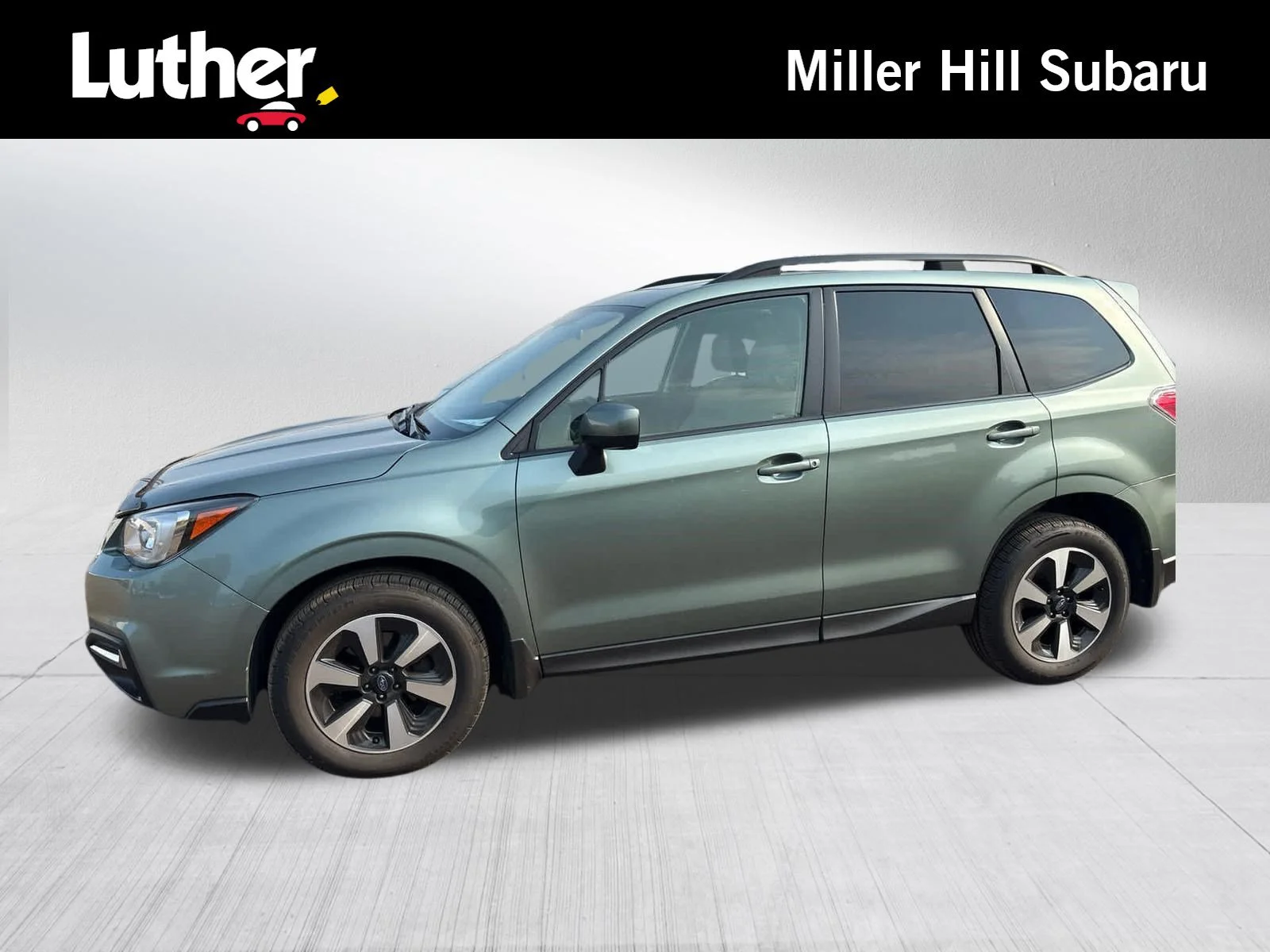 Used 2017 Jasmine Green Metallic Subaru Premium image 1