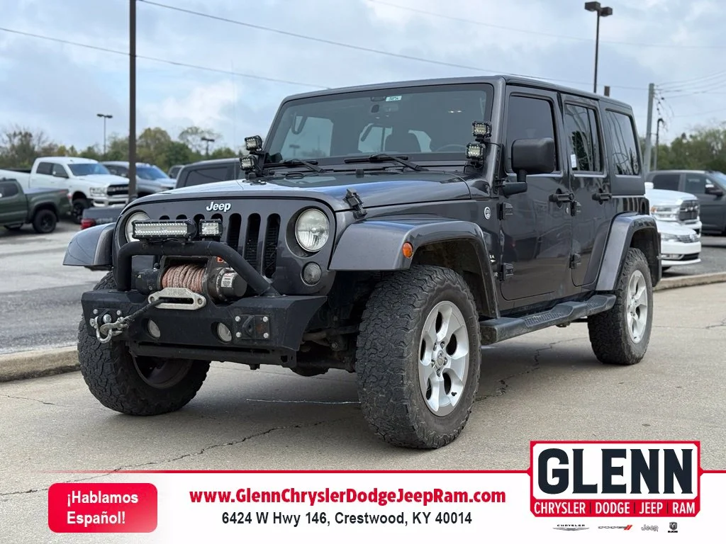 Used 2014 Gray Jeep Unlimited Sahara image 1