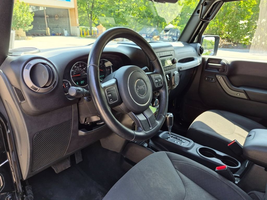 Used 2016 Black Jeep Unlimited Sport image 12